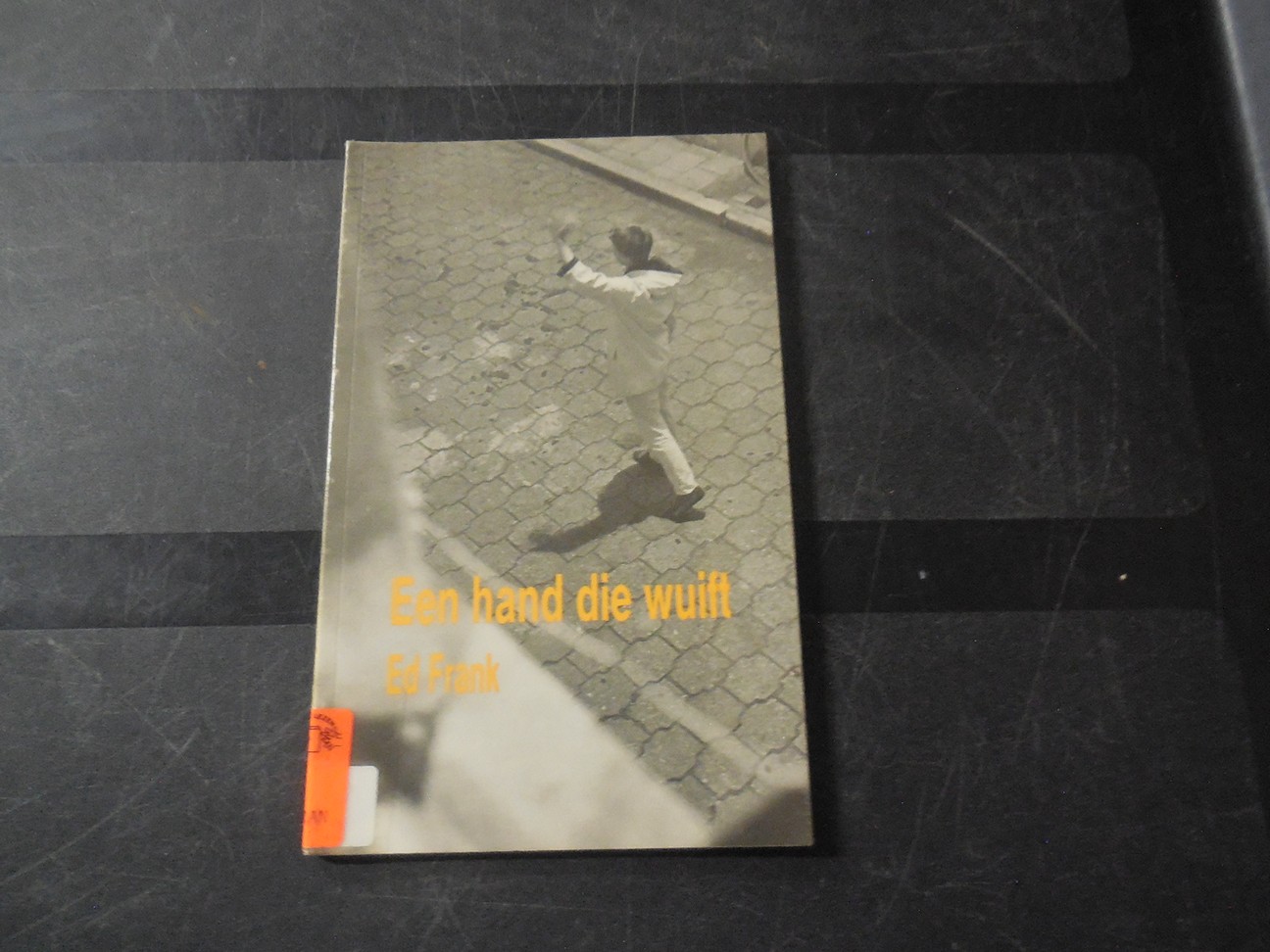 Een hand die wuift