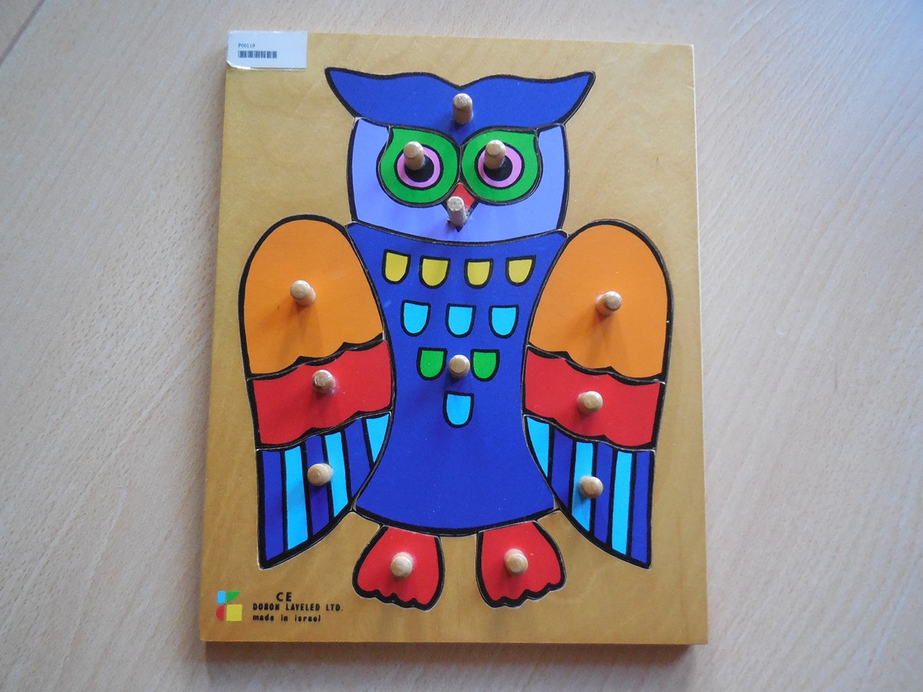 Knoppuzzel “Uil”