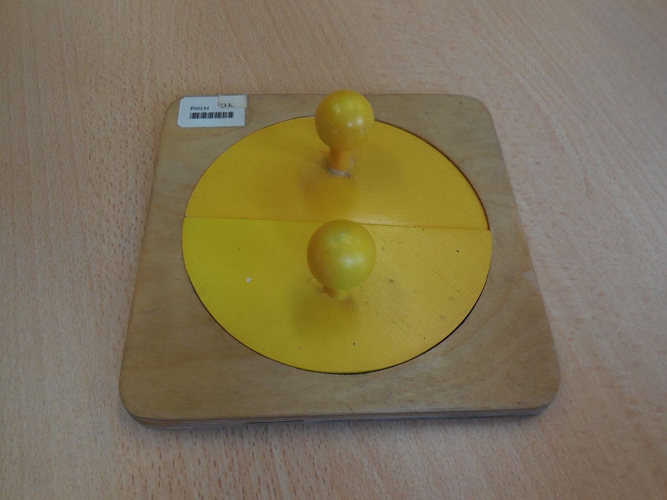 Knoppuzzel “Gele cirkel”