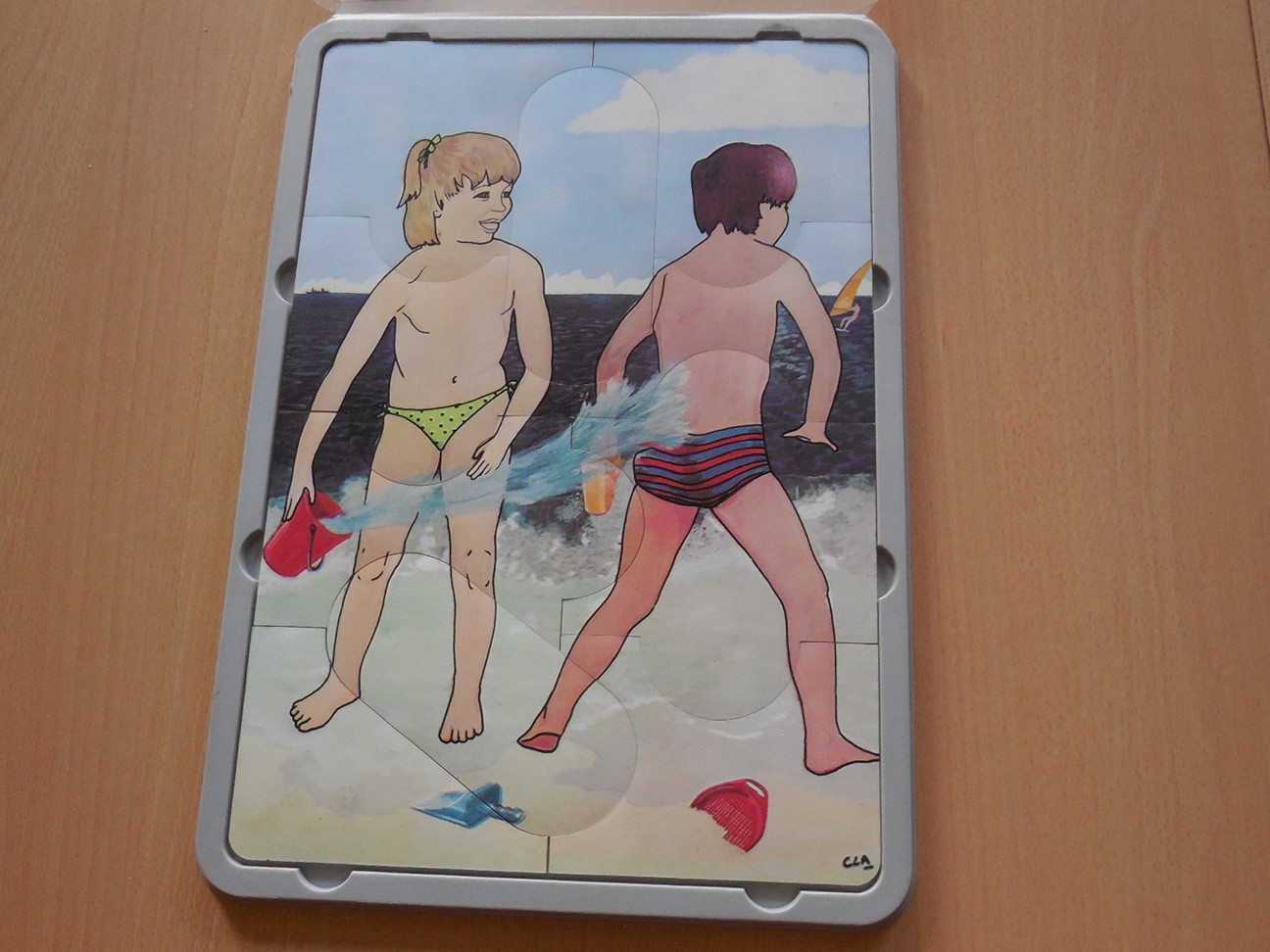“Jongen en meisje aan zee”
