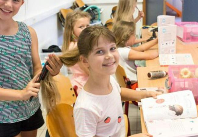 Knappe kapsels © Heyo Vakantiekampen