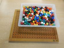 Insteekmozaik en knoppenset
