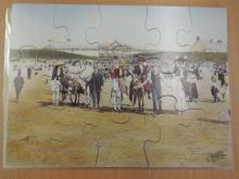 Ruiters aan het strand	